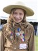 Young Chautauqua character Annie Oakley displays her medals